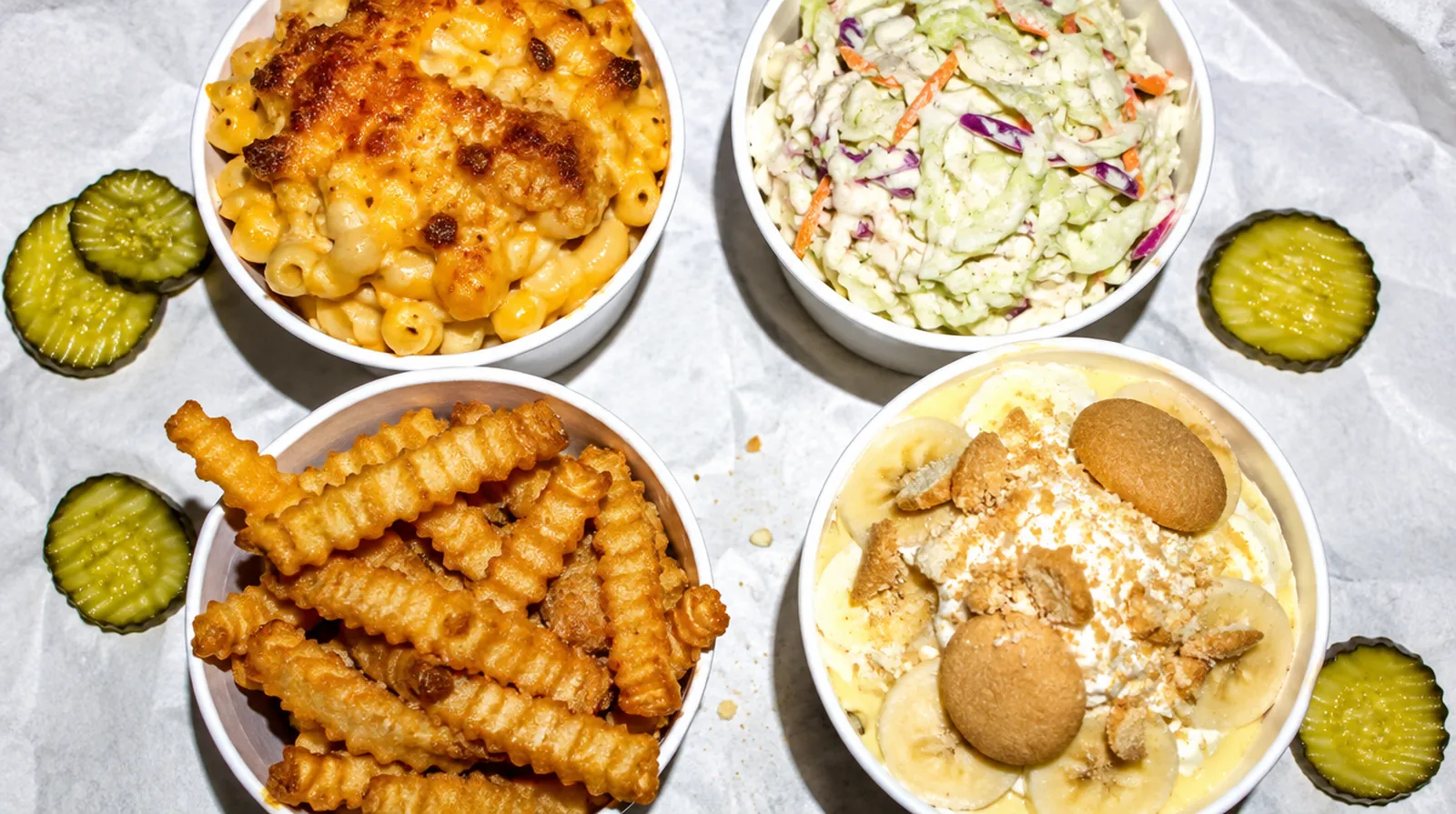 Mac and cheese, slaw, crinkle fries and banana pudding